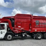 side view of trash rangers heavy truck
