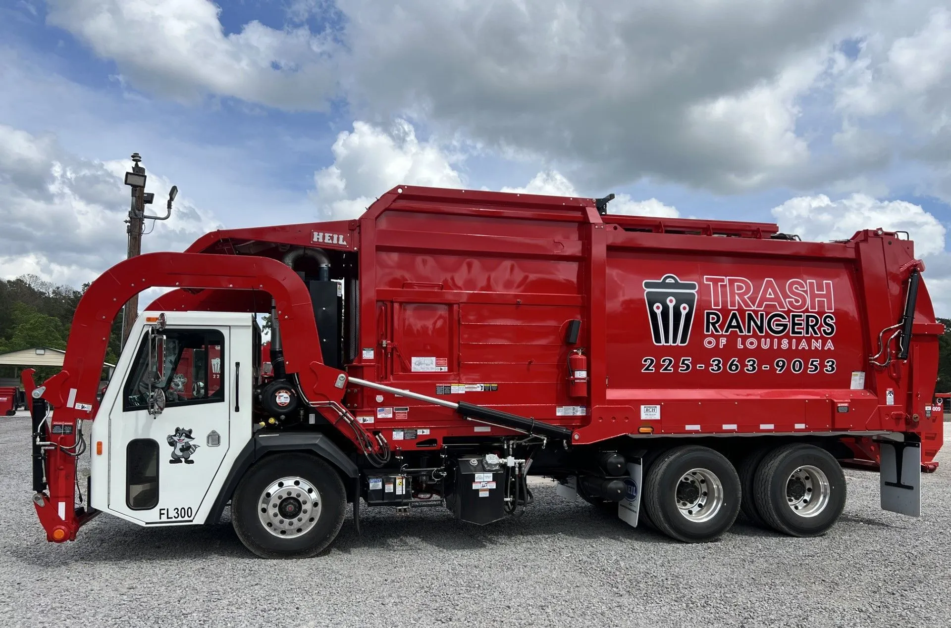 side view of trash rangers heavy truck