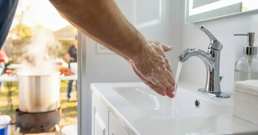 washing hands restroom trailer crawfish boil